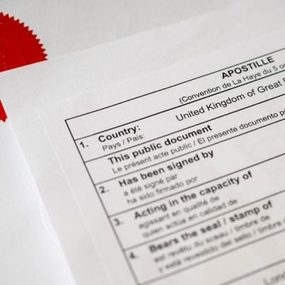 Apostille document with a prominent UK insignia, symbolising Skrivanek's document authentication, legalisation and Apostille services.
